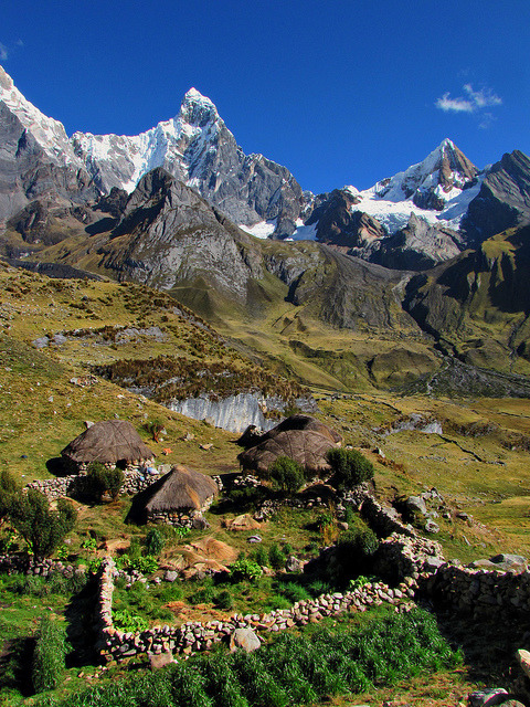 A hamlet of houses in front of Jirishanca, Huayhuash Trek, Peru