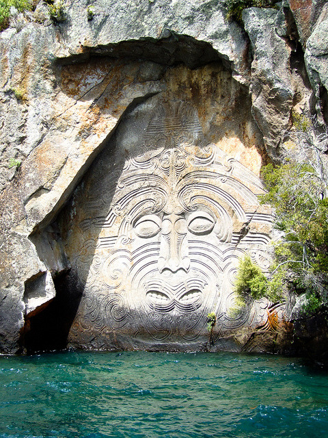 Maori rock carvings at Mine Bay on Lake Taupo, New Zealand