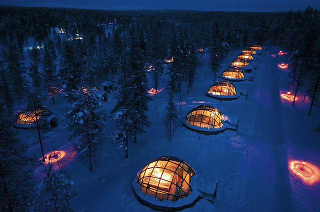 Watching the northern lights from glass igloos in Kakslauttanen, Finland