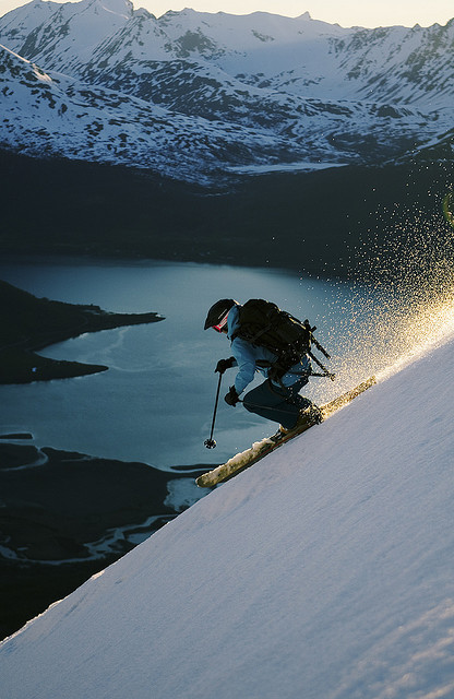 Skiing above Sorfjorden in Lyngen Alps, Norway
